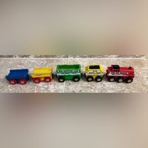 5 wooden train cars (including engine) compatible with Brio and Thomas.